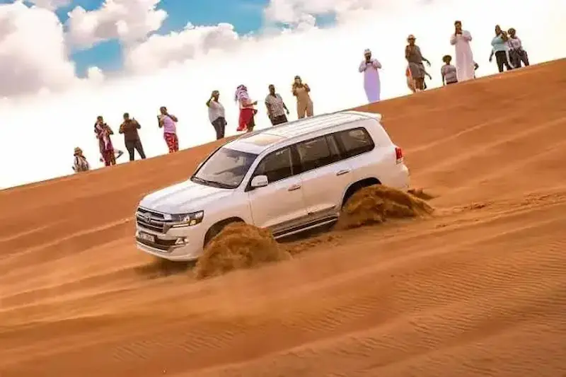 Luxurious VIP desert camp with private majlis seating and lanterns for an exclusive Dubai desert safari