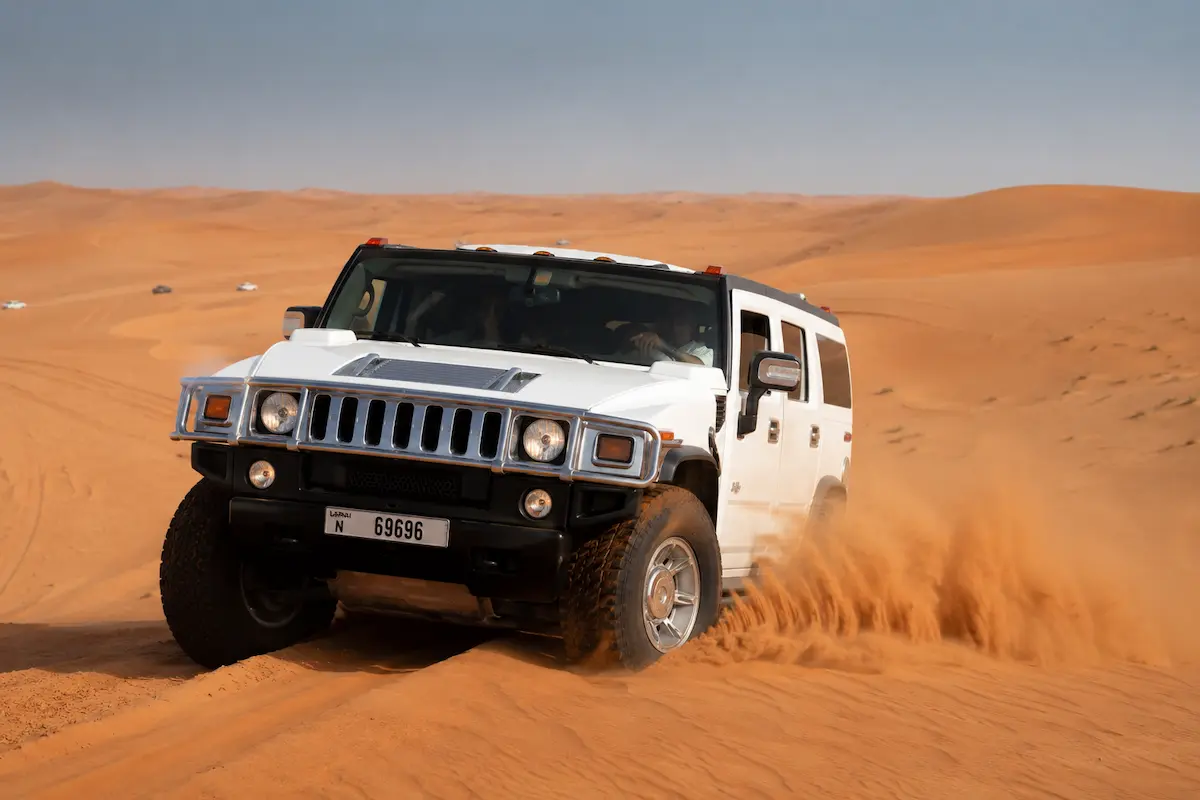 Hummer desert tour across Dubai sand dunes